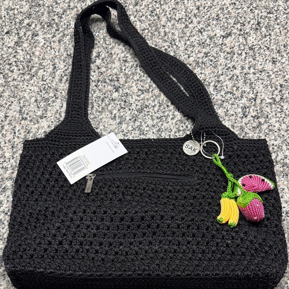 The Sak Black Crochet Shoulder Bag with Fruit Charm
